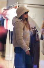 SYDNEY SWEENEY and Jonathan Davino Shopping with Friends at the LESET Store in New York 12/14/2024