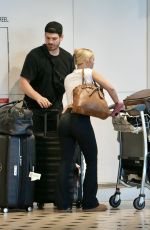 TAMMY HEMBROW and Matt Zukowski Return From Their Honeymoon in Lapland at Brisbane Airport 12/08/2024