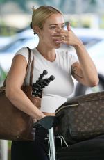 TAMMY HEMBROW and Matt Zukowski Return From Their Honeymoon in Lapland at Brisbane Airport 12/08/2024