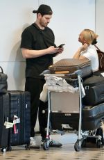 TAMMY HEMBROW and Matt Zukowski Return From Their Honeymoon in Lapland at Brisbane Airport 12/08/2024