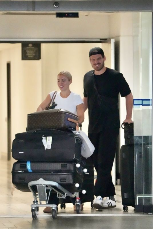 TAMMY HEMBROW and Matt Zukowski Return From Their Honeymoon in Lapland at Brisbane Airport 12/08/2024