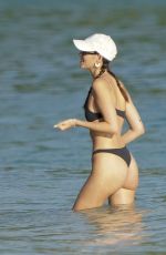 VITTORIA CERETTI and JUSTINE SKYE in Bikinis on the Beach in St. Barts 12/29/2024