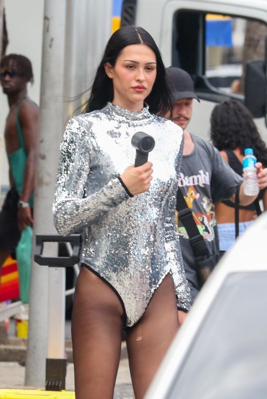 AMELIA HAMLIN at a Photoshoot at Copacabana Beach in Rio De Janeiro 01/20/2025