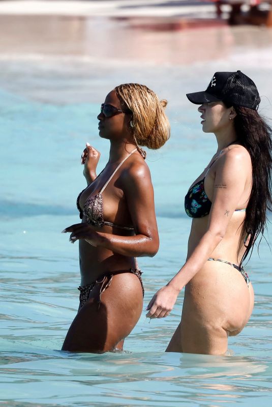 ANASTASIA KARANIKOLAOU and JUSTINE SKYE in Bikinis at a Beach in St Barts 01/02/2025
