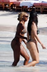 ANASTASIA KARANIKOLAOU and JUSTINE SKYE in Bikinis at a Beach in St Barts 01/02/2025