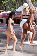 ANASTASIA KARANIKOLAOU and JUSTINE SKYE in Bikinis at a Beach in St Barts 01/02/2025