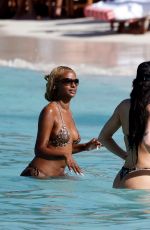 ANASTASIA KARANIKOLAOU and JUSTINE SKYE in Bikinis at a Beach in St Barts 01/02/2025
