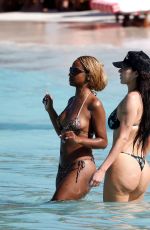 ANASTASIA KARANIKOLAOU and JUSTINE SKYE in Bikinis at a Beach in St Barts 01/02/2025