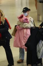 ARIANA GRANDE Arrives in Miami Following Oscar Nomination 01/25/2025