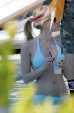 AVRIL LAVIGNE in Bikini at a Pool in Miami 01/30/2008