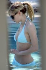 AVRIL LAVIGNE in Bikini at a Pool in Miami 01/30/2008