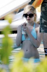 AVRIL LAVIGNE in Bikini at a Pool in Miami 01/30/2008