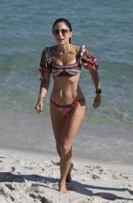 BETHENNY FRANKEL in Bikini with Puffy Sleeves at a Beach on New Year