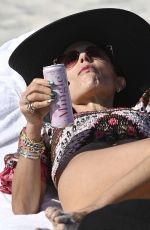 BETHENNY FRANKEL in Bikini with Puffy Sleeves at a Beach on New Year