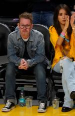 BRENDA SONG and Macaulay Culkin at NBA Game Between Boston Celtics and L.A. Lakers in Los Angeles 01/23/2025
