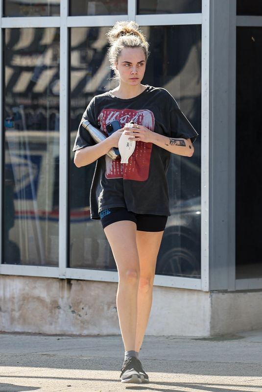 CARA DELEVINGNE in a Vintage Bush Tee Leaves Dogpound Workout in West Hollywood 01/27/2025