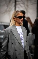 CAROLINE DAUR Arrives at Prada Fashion Show at Milan Fashion Week 01/19/2025