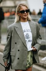 CAROLINE DAUR Arrives at Prada Fashion Show at Milan Fashion Week 01/19/2025