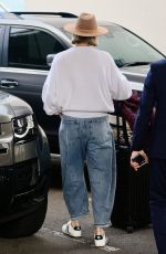CHARLIZE THERON Arrives In Sydney to Film Netflix