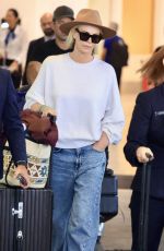 CHARLIZE THERON Arrives In Sydney to Film Netflix