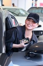 CHRISSY TEIGEN Visits Dermatologist Before Stopping at Valet in Beverly Hills 01/23/2025