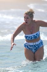 CLAIRE SWEENEY in Bikini at a Beach in Barbados 12/30/2024