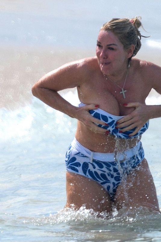 CLAIRE SWEENEY in Bikini at a Beach in Barbados 12/30/2024