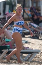 CLAIRE SWEENEY in Bikini at a Beach in Barbados 12/30/2024