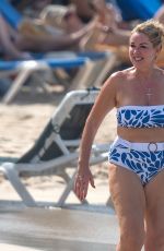CLAIRE SWEENEY in Bikini at a Beach in Barbados 12/30/2024