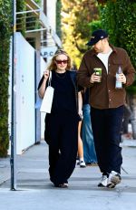 DAKOTA FANNING Out Shopping on Melrose Place with David Bernard 01/02/2025
