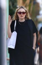 DAKOTA FANNING Out Shopping on Melrose Place with David Bernard 01/02/2025