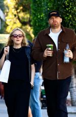 DAKOTA FANNING Out Shopping on Melrose Place with David Bernard 01/02/2025
