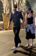 DAKOTA JOHNSON and Chris Martin Out in Mumbai 01/17/2025