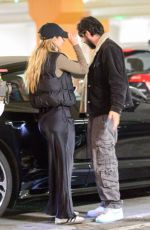 ELIZABETH OLSEN and Robbie Arnett Pack on the PDA 01/01/2025