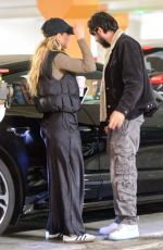 ELIZABETH OLSEN and Robbie Arnett Pack on the PDA 01/01/2025