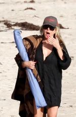 HEIDI KLUM and Tom Kaulitz Strolls Along a Beach Full of Nudists in St Barts 01/14/2025