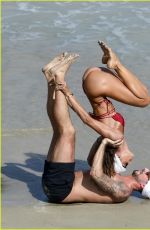 IZABEL GOULART in Bikini Doing Yoga at a Beach in St. Barts 12/26/2024