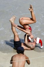 IZABEL GOULART in Bikini Doing Yoga at a Beach in St. Barts 12/26/2024