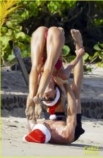 IZABEL GOULART in Bikini Doing Yoga at a Beach in St. Barts 12/26/2024