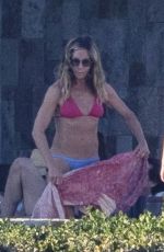 JENNIFER ANISTON in Bikini Ringing in 2025 with Jason Bateman and Friends in Cabo 01/02/2025