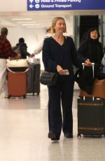 JULIANNE HOUGH Makes Low-Key Arrival in Los Angeles 01/21/2025