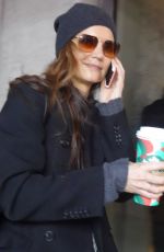 KATIE HOLMES Grabbing a Coffee at Starbucks at Times Square in New York 12/02/2024
