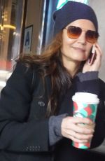 KATIE HOLMES Grabbing a Coffee at Starbucks at Times Square in New York 12/02/2024