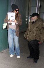 KATIE HOLMES Greeting Radio Man During an Outing in New York City 01/12/2025