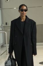 LAURA HARRIER in a Black Ensemble at Paris Airport 01/26/2025