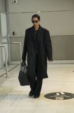 LAURA HARRIER in a Black Ensemble at Paris Airport 01/26/2025