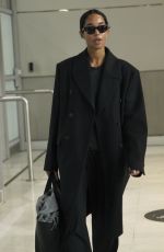 LAURA HARRIER in a Black Ensemble at Paris Airport 01/26/2025