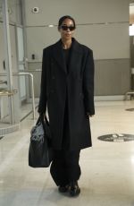 LAURA HARRIER in a Black Ensemble at Paris Airport 01/26/2025
