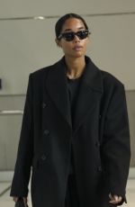 LAURA HARRIER in a Black Ensemble at Paris Airport 01/26/2025