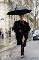 LEONIE HANNE Arrives at Elie Saab Haute Couture SS25 Show at Palais de Tokyo in Paris 01/29/2025